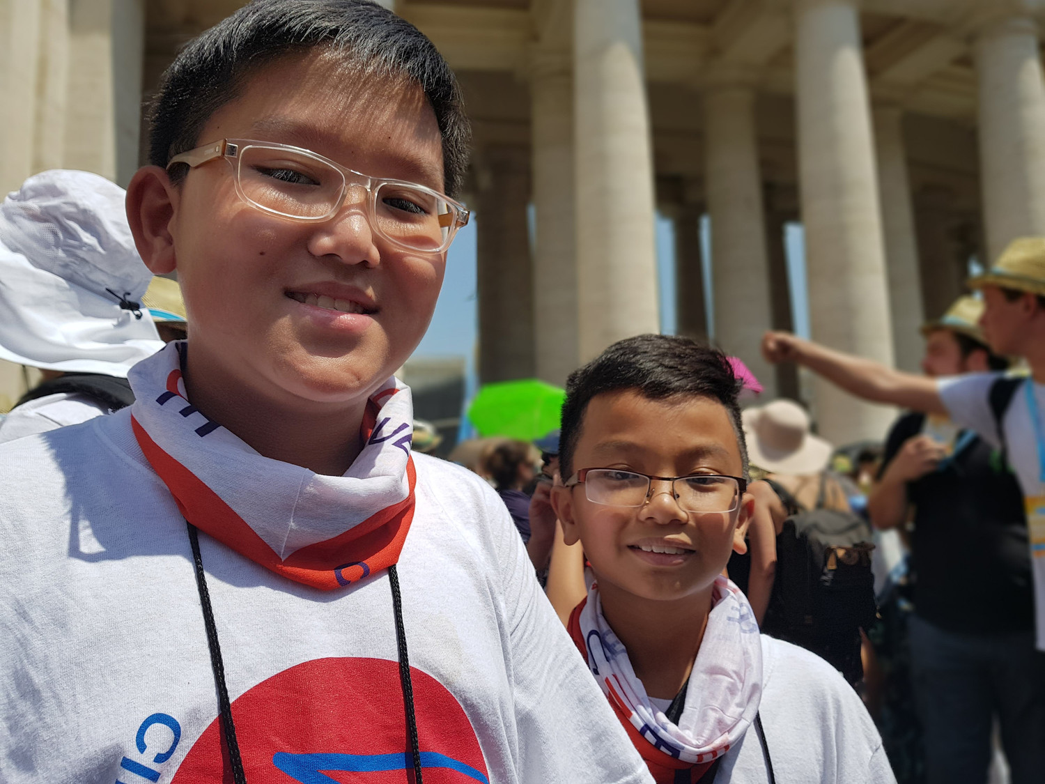 Joseph Luu and Francis Tran, altar servers from the parish of Mary, Queen of Vietnam in New Orleans, Louisiana, wait to enter St. Peter’s Square at the Vatican for an international meeting of altar servers July 31. The pilgrimage, sponsored by the German bishops’ conference, included tens of thousands of Germans ages 13 to 23 and altar servers from 18 countries.
